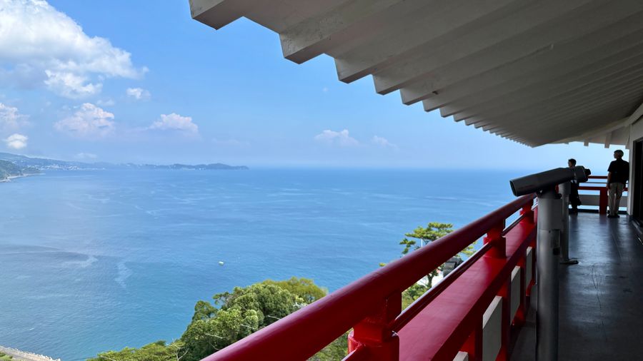 Observation deck with red railings and telescopes
